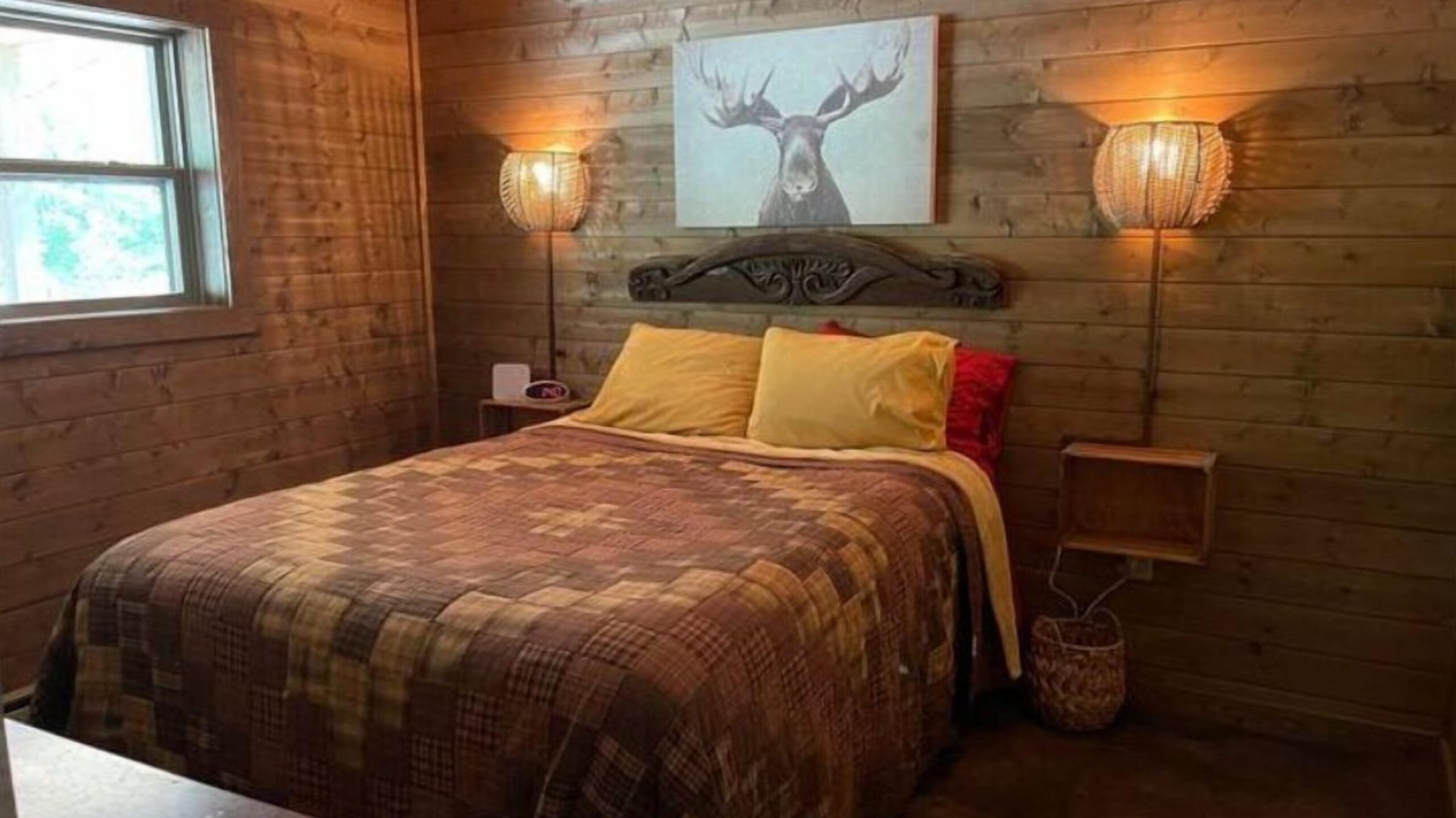 a bedroom with a large bed in a room