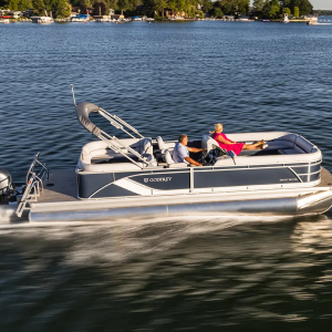 a godfrey pontoon in a body of water