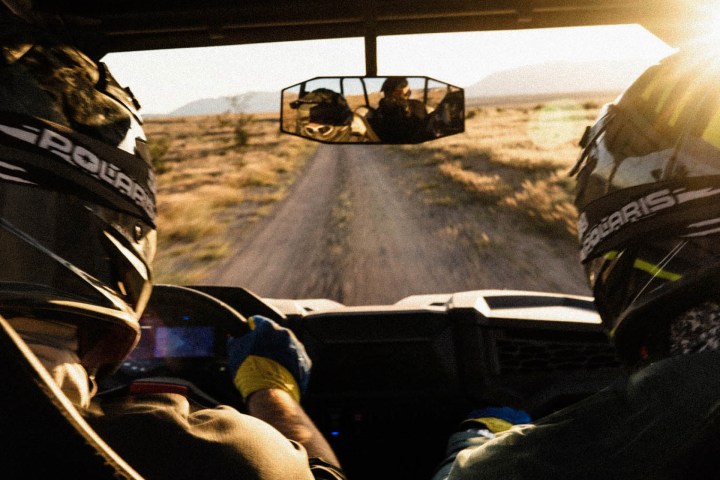 driving down the trail in a UTV