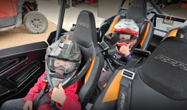 a person sitting on a motorcycle