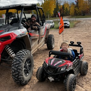 a motorcycle parked on a dirt road