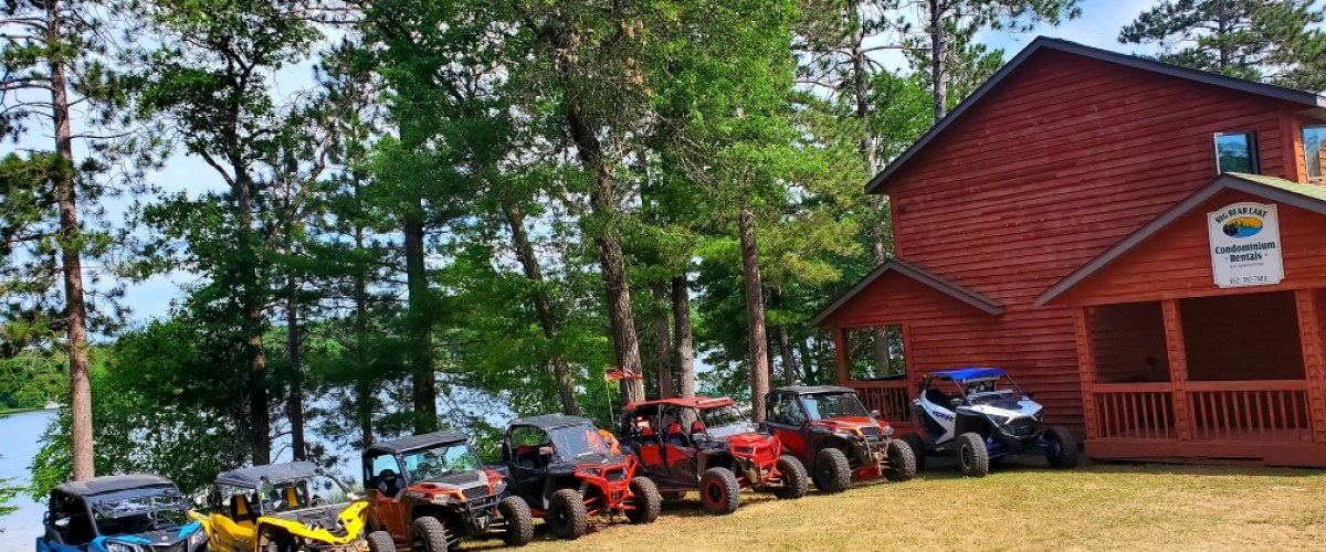a group of people sitting in a yard