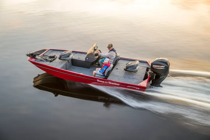 a small boat in a body of water