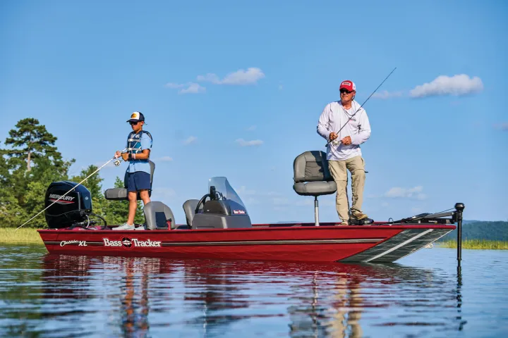 a group of people riding on the back of a boat