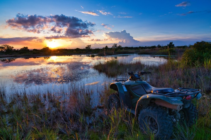 a sunset over a body of water