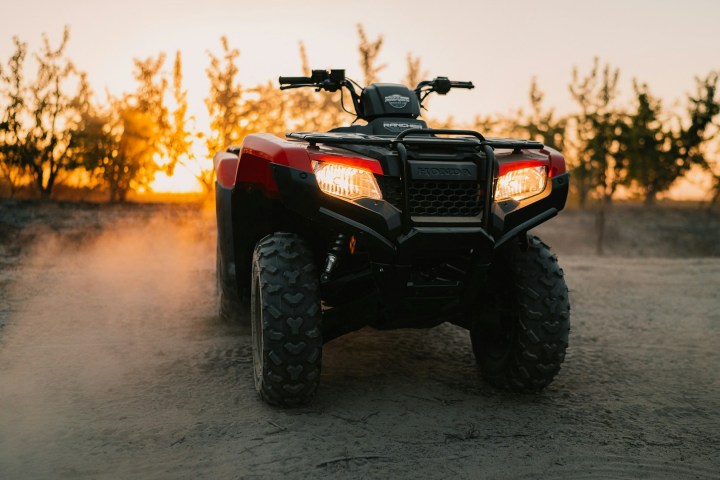 a motorcycle parked on the side of a vehicle