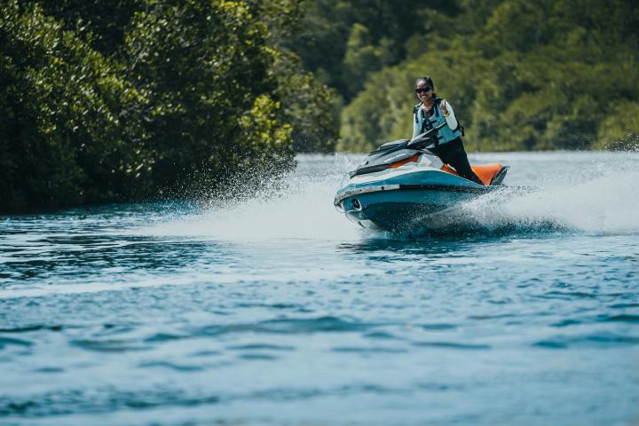 a man riding a jet ski in the water