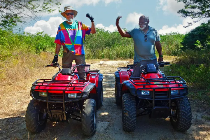a man riding on the back of a truck